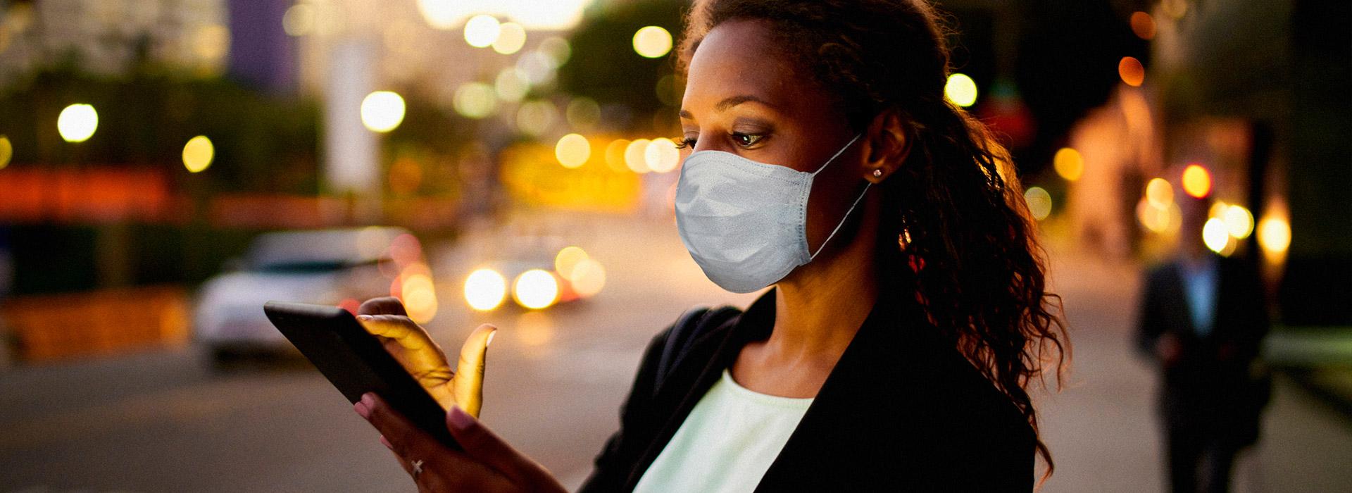 pandemic - woman wearing a surgical mask